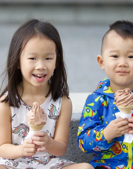 Children eating icecream.
